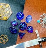 Nocturnal Blue Chessex Nebula Dice Set  These genuine Chessex polyhedral dice sets are a perfect addition to any dice collection.  They are standard 16mm polyhedral dice sets perfect for Tabletop games and RPG's such as pathfinder or dungeons and dragons.  This set includes one of each D20, D12, D10, D%, D8, D6, D4.  Why Choose Chessex?  Chessex are the market leaders in quality of dice and consistency of roll and have been creating dice for over 30 years