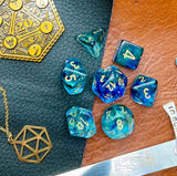 Oceanic Nebula Chessex Dice Set  These genuine Chessex polyhedral dice sets are a perfect addition to any dice collection.  They are standard 16mm polyhedral dice sets perfect for Tabletop games and RPG's such as pathfinder or dungeons and dragons.  This set includes one of each D20, D12, D10, D%, D8, D6, D4.  Why Choose Chessex?  Chessex are the market leaders in quality of dice and consistency of roll and have been creating dice for over 30 years