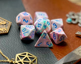 Pop Art Festive Chessex Dice Set  These genuine Chessex polyhedral dice sets are a perfect addition to any dice collection.  They are standard 16mm polyhedral dice sets perfect for Tabletop games and RPG's such as pathfinder or dungeons and dragons.  This set includes one of each D20, D12, D10, D%, D8, D6, D4.  Why Choose Chessex?  Chessex are the market leaders in quality of dice and consistency of roll and have been creating dice for over 30 years