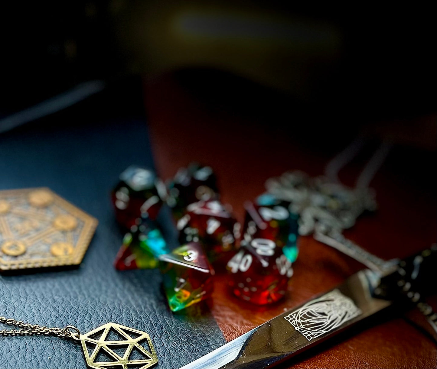 Pride glitter resin polyhedral dice set.  Yet another reason to add to your growing dice collection with these fantastic resin dice. These are beautiful translucent dice featuring a range of reds, yellows and blues with gold glitter running throughout.   They are standard 16mm polyhedral dice sets perfect for Tabletop games and RPG's such as pathfinder or dungeons and dragons.  This set includes one of each D20, D12, D10, D%, D8, D6, D4.