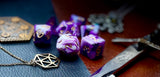 Purple and White Marble Polyhedral Dice Set  Roll with style with these purple and white marbled resin polyhedral dice set.  They are standard 16mm polyhedral dice sets perfect for Tabletop games and RPG's such as pathfinder or dungeons and dragons.  This set includes one of each D20, D12, D10, D%, D8, D6, D4.