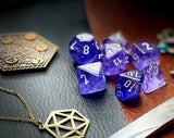 Purple Nebula Chessex Dice Set  These genuine Chessex polyhedral dice sets are a perfect addition to any dice collection.  They are standard 16mm polyhedral dice sets perfect for Tabletop games and RPG's such as pathfinder or dungeons and dragons.  This set includes one of each D20, D12, D10, D%, D8, D6, D4.  Why Choose Chessex?  Chessex are the market leaders in quality of dice and consistency of roll and have been creating dice for over 30 years