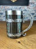 Viking Style Decorative Resin Drinking Tankard With Stainless Steel Insert.  Drink in style with our highly decorative tankard with Norse style runes inscribed down the sides. Holding 500ml you can drink with your clan in style. Perfect for decorating home bars, cosplay, tabletop gaming and all fans of Norse mythology and Viking decoration.