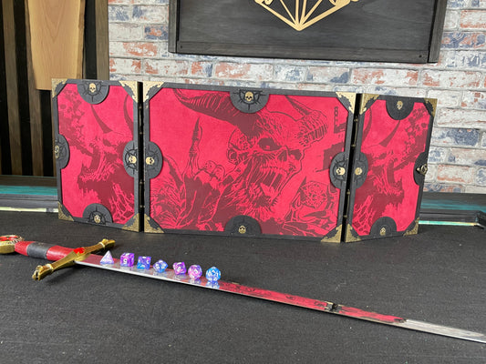 Dice With The Devil Dungeon Master Screen is a must-have for any tabletop gaming enthusiast. Crafted from high-quality wood and engraved with intricate designs, this screen is both sturdy and visually stunning. Ideal for tabletop gaming, Dungeons and Dragons, Pathfinder and many other TTRPG's