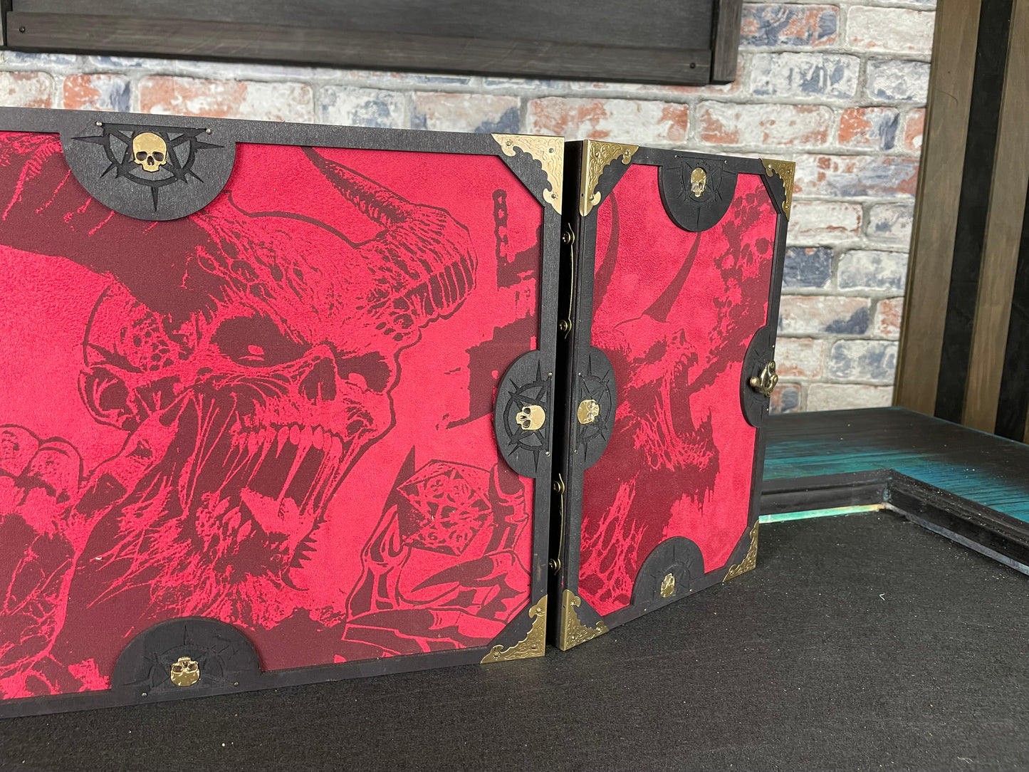 Dice With The Devil Dungeon Master Screen is a must-have for any tabletop gaming enthusiast. Crafted from high-quality wood and engraved with intricate designs, this screen is both sturdy and visually stunning. Ideal for tabletop gaming, Dungeons and Dragons, Pathfinder and many other TTRPG's