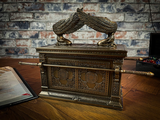 Cast in the finest resin before being given a bronzed finish, this ethereal box is super detailed and makes a perfect display piece. The Ark of the Covenant is a gold-covered chest that holds the two stone tablets of the Ten Commandments and is replicated here. Free UK delivery by Fandomonium