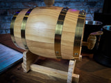 1.5L solid wood beer and wine barrel with tap. Perfect for holding your beverage of choice and maintaining your tavern feel around your table.  Featuring a removable tap to fill your plastic lined barrel it is super easy to refill and wash out. Also comes with a wooden stand to hold your barrel in place. Free UK Delivery with Fandomonium