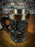This occult tankard is a macabre lovers dream. Each side of the body has a small patent red background which sits under a raised pentagram, the words 'Solve' and 'Coagula' adorn its outer circle. Atop this the head of a triple-horned Sabbatic Goat with a pentagram raised from its skull. Free UK delivery buy Fandomonium