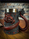 Drink deeply of a rich fantasy world with this enchanting Dragon Coil Tankard. Designed with a red onyx Dragon wrapped around the entirety of the tankard, jealously guarding the red jewels and your precious drink. Free UK Delivery from Fandomonium