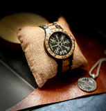 Wooden Norse Viking Design Watch. A unique style of watch with the strap, front and back of the watch all made from highly polished wood. Each time piece comes in a wooden display box and makes a perfect gift for fans of Norse Mythology and Viking Style. Complete with the Vegvisir Viking wayfinder on the watch face giving a unique and stylish look. Each watch also comes with a tool to help you add and remove links and a care &amp; instruction manual.