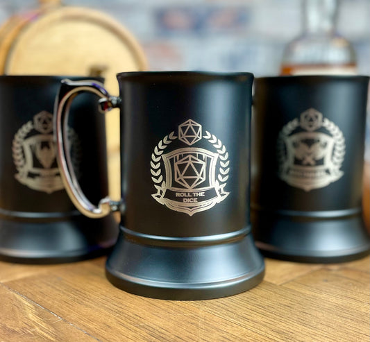 Engraved stainless steel drinking tankard with personalised coat of arms.  Black enameled tankard engraved with your choice of 16 design options (See images for options)  Standing 13cm tall and holding 500ml, you'll stay refreshed during even the most tense combat!