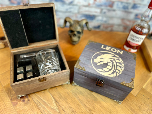 Personalised Tabletop Gaming Design Whiskey Set.  This unique and fun sets contains a set of 6 whiskey stones engraved to look like dice and a cut glass tumbler - all in a solid wood engraved gift box in your choice of 8 colours (Dark Oak and Black shown in images)