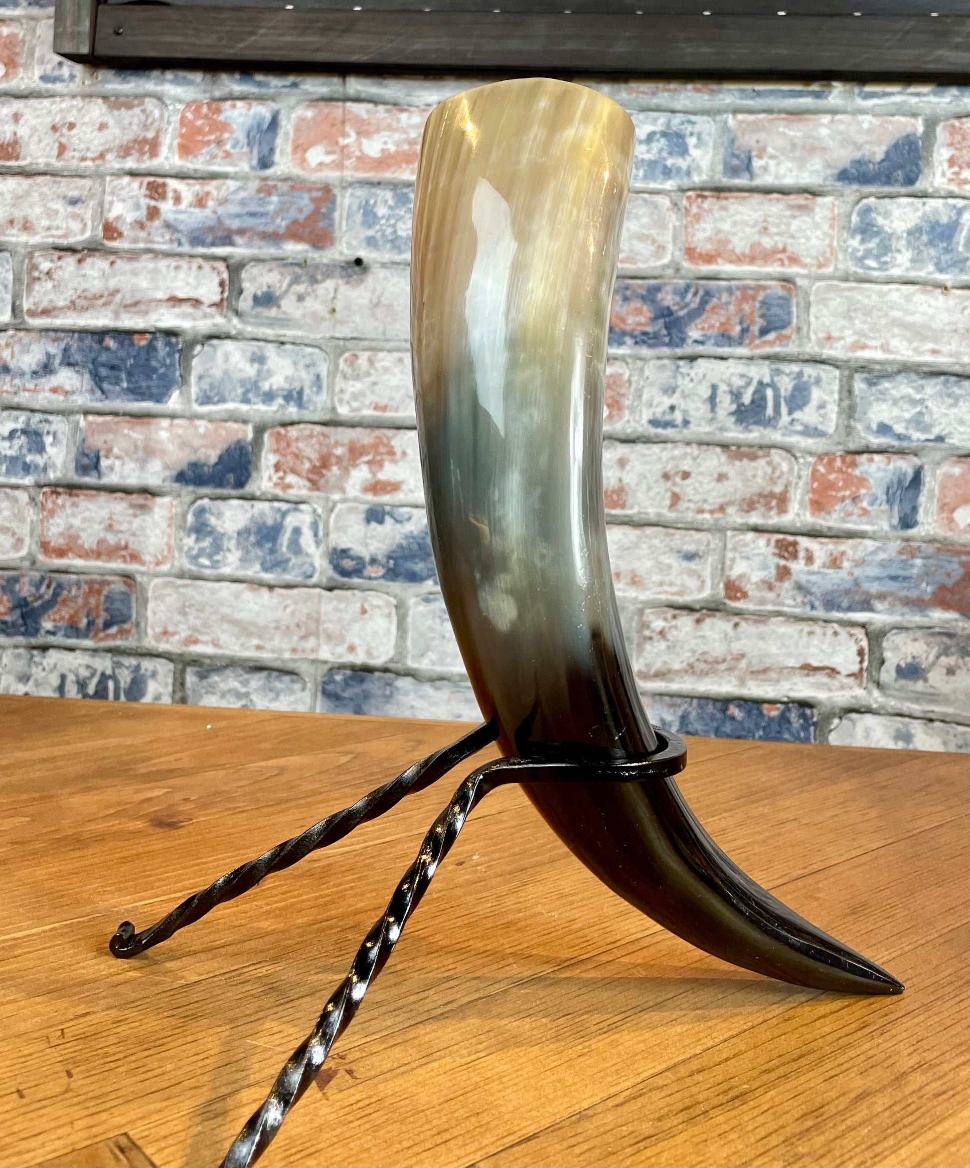 Large antique effect drinking horn. Made from solid 100% natural horn; these horns are perfect for drinking your beverage of choice while living your best viking life. Standing roughly 9-11inches (25-30cm) tall, this drinking horn will make a statement!