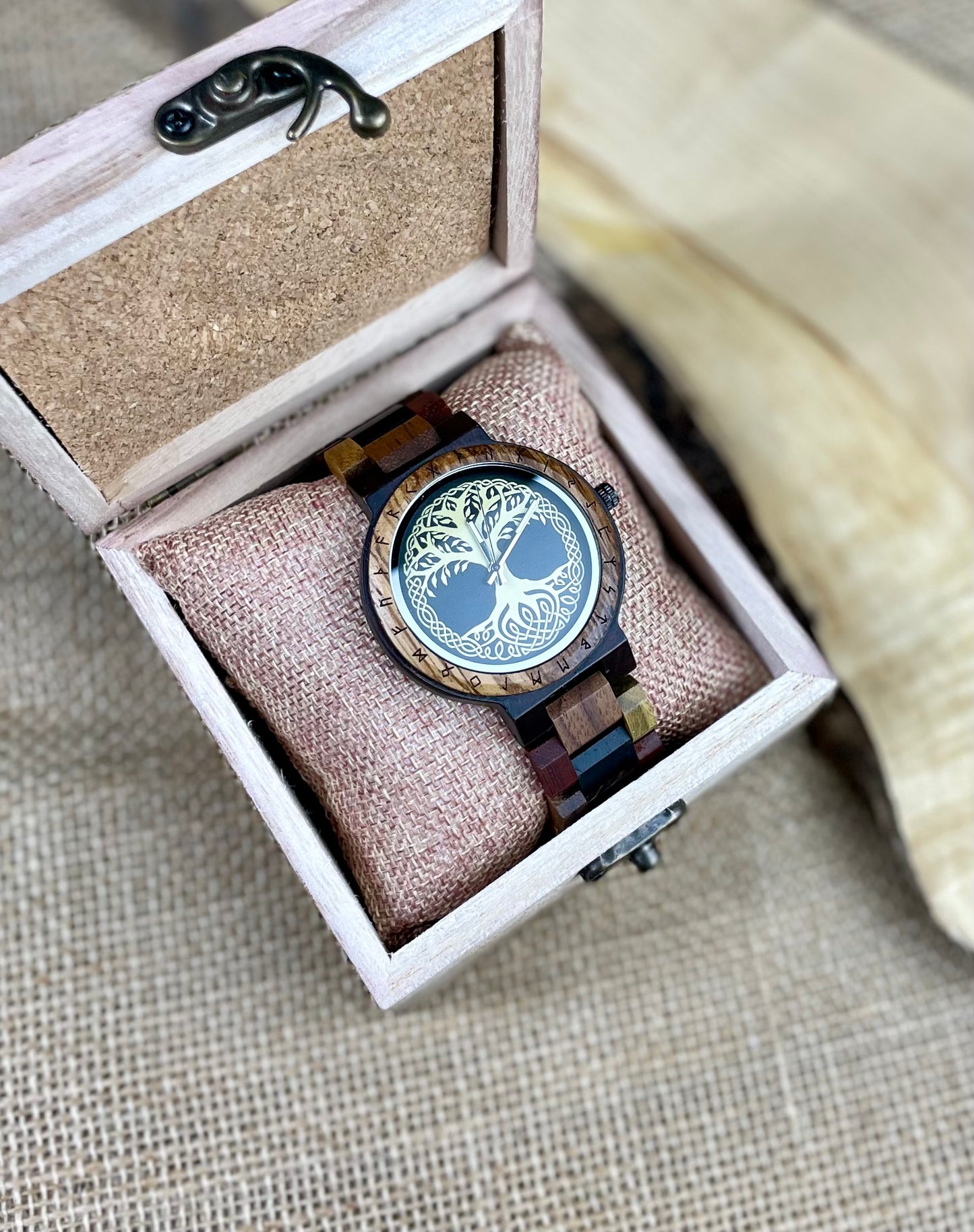 Wooden Norse Viking Design Watch. A unique style of watch with the strap, front and back of the watch all made from highly polished wood. Each time piece comes in a wooden display box and makes a perfect gift for fans of Norse Mythology and Viking Style.