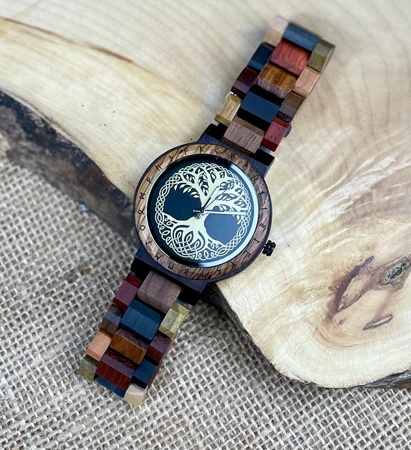 Wooden Norse Viking Design Watch. A unique style of watch with the strap, front and back of the watch all made from highly polished wood. Each time piece comes in a wooden display box and makes a perfect gift for fans of Norse Mythology and Viking Style.