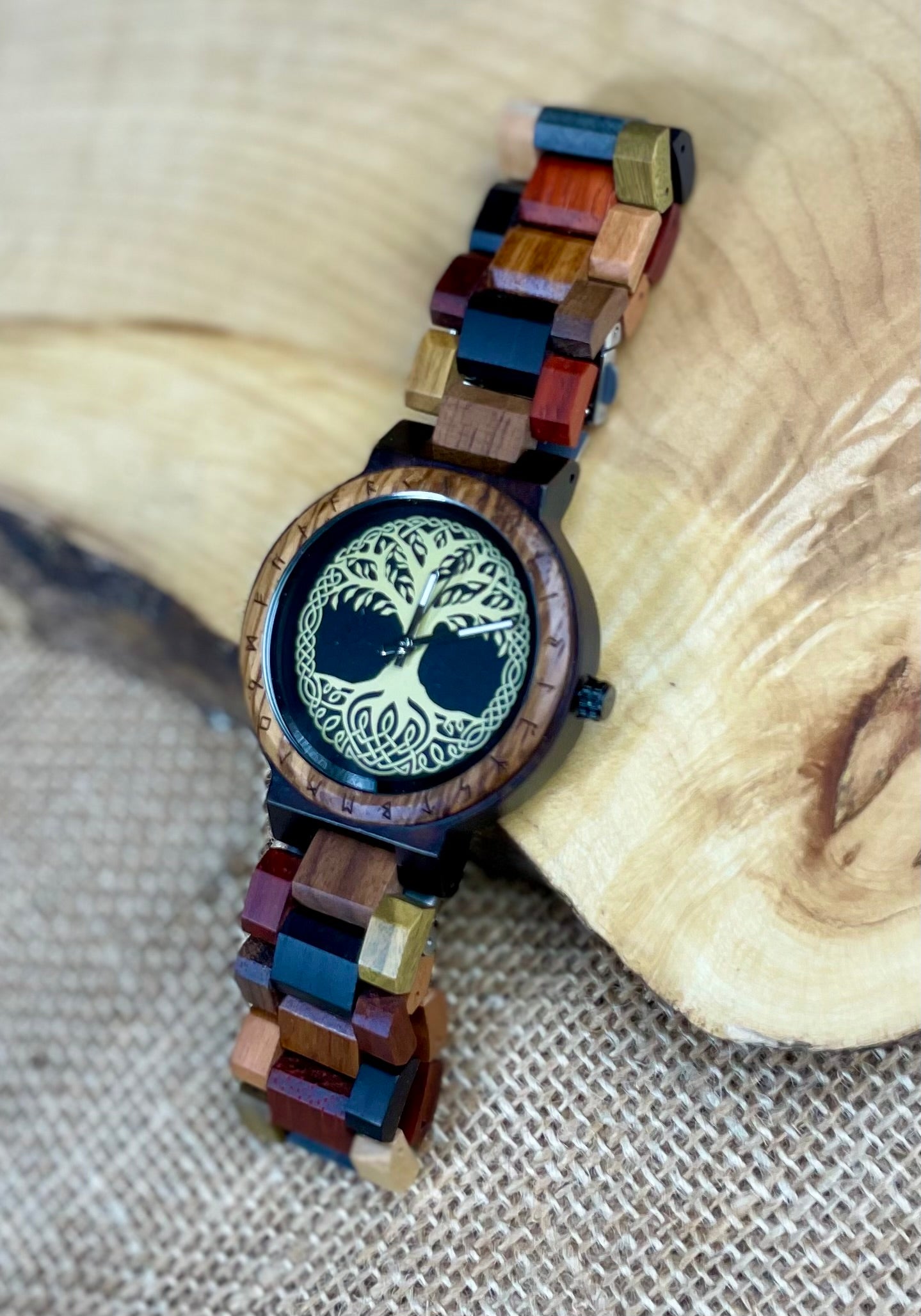 Wooden Norse Viking Design Watch. A unique style of watch with the strap, front and back of the watch all made from highly polished wood. Each time piece comes in a wooden display box and makes a perfect gift for fans of Norse Mythology and Viking Style.