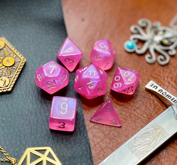 Pink Shimmer Chessex Borealis Dice Set  These genuine Chessex polyhedral dice sets are a perfect addition to any dice collection.  They are standard 16mm polyhedral dice sets perfect for Tabletop games and RPG's such as pathfinder or dungeons and dragons.