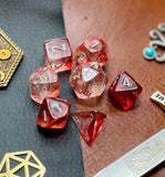Red Nebula Chessex Dice Set  These genuine Chessex polyhedral dice sets are a perfect addition to any dice collection.  They are standard 16mm polyhedral dice sets perfect for Tabletop games and RPG's such as pathfinder or dungeons and dragons.  This set includes one of each D20, D12, D10, D%, D8, D6, D4.  Why Choose Chessex?  Chessex are the market leaders in quality of dice and consistency of roll and have been creating dice for over 30 years