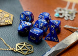 Royal Blue Scarab Chessex Dice Set  These genuine Chessex polyhedral dice sets are a perfect addition to any dice collection.  They are standard 16mm polyhedral dice sets perfect for Tabletop games and RPG's such as pathfinder or dungeons and dragons.  This set includes one of each D20, D12, D10, D%, D8, D6, D4.  Why Choose Chessex?  Chessex are the market leaders in quality of dice and consistency of roll and have been creating dice for over 30 years