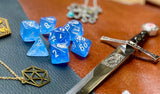 Sky Blue Borealis Chessex Dice Set. These genuine Chessex polyhedral dice sets are a perfect addition to any dice collection. They are standard 16mm polyhedral dice sets perfect for Tabletop games and RPG's such as pathfinder or dungeons and dragons. This set includes one of each D20, D12, D10, D%, D8, D6, D4.