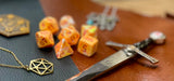 Sunburst Festive Chessex Dice Set  These genuine Chessex polyhedral dice sets are a perfect addition to any dice collection.  They are standard 16mm polyhedral dice sets perfect for Tabletop games and RPG's such as pathfinder or dungeons and dragons.  This set includes one of each D20, D12, D10, D%, D8, D6, D4.  Why Choose Chessex?  Chessex are the market leaders in quality of dice and consistency of roll and have been creating dice for over 30 years