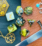 From The Depths Polyhedral Dice Set  Explore the deep with these black, green and yellow marbled resin polyhedral dice set.  They are standard 16mm polyhedral dice sets perfect for Tabletop games and RPG's such as pathfinder or dungeons and dragons.  This set includes one of each D20, D12, D10, D%, D8, D6, D4.