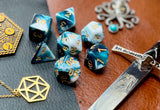 Teal and White Marble Polyhedral Dice Set  Roll with style with these teal and white marbled resin polyhedral dice set.  They are standard 16mm polyhedral dice sets perfect for Tabletop games and RPG's such as pathfinder or dungeons and dragons.  This set includes one of each D20, D12, D10, D%, D8, D6, D4.