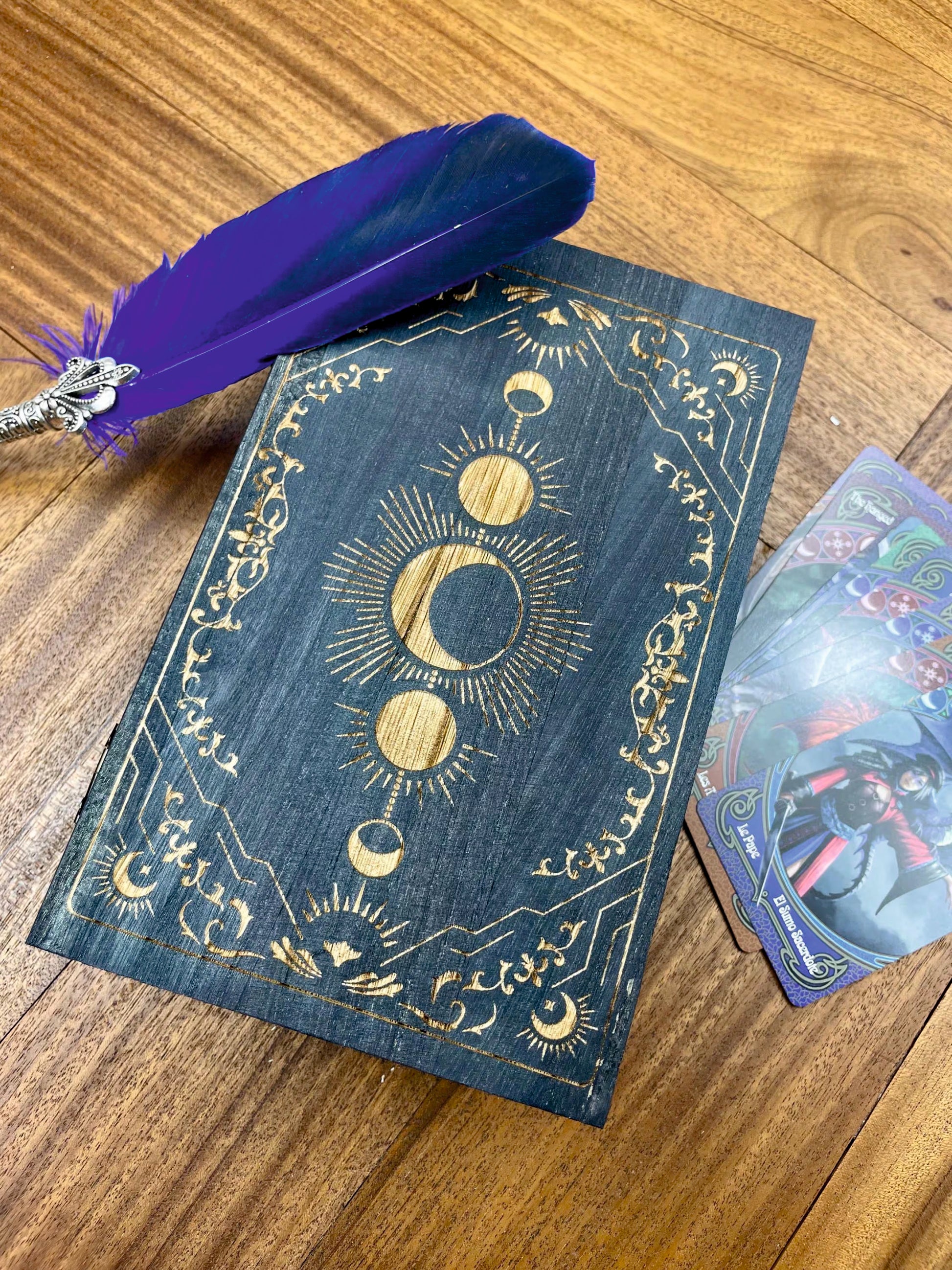 Solid Wood Tarot Deck Box In Choice of 14 Designs and 8 Colours.

Made from solid paulwonia wood and engraved to order; our boxes are perfect for storing, tarot cards, crystals, coins and any other types of trinket you can think of. Capable of comfortable hold a deck of standard sized tarot cards; these make an ideal gift or treat for yourself.