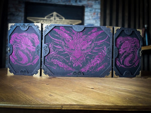 The Dragon's Hoard Dungeon Master Screen is a must-have for any tabletop gaming enthusiast. Crafted from high-quality wood and engraved with intricate designs, this screen is both sturdy and visually stunning. Ideal for tabletop gaming, Dungeons and Dragons, Pathfinder and many other TTRPG's