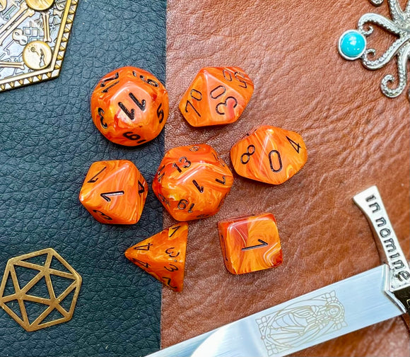 Orange Vortex Chessex Dice Set. These genuine Chessex polyhedral dice sets are a perfect addition to any dice collection. They are standard 16mm polyhedral dice sets perfect for Tabletop games and RPG's such as pathfinder or dungeons and dragons. This set includes one of each D20, D12, D10, D%, D8, D6, D4.