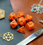 Orange Vortex Chessex Dice Set. These genuine Chessex polyhedral dice sets are a perfect addition to any dice collection. They are standard 16mm polyhedral dice sets perfect for Tabletop games and RPG's such as pathfinder or dungeons and dragons. This set includes one of each D20, D12, D10, D%, D8, D6, D4.