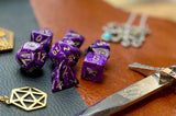 Purple Vortex Chessex Dice Set. These genuine Chessex polyhedral dice sets are a perfect addition to any dice collection. They are standard 16mm polyhedral dice sets perfect for Tabletop games and RPG's such as pathfinder or dungeons and dragons. This set includes one of each D20, D12, D10, D%, D8, D6, D4.