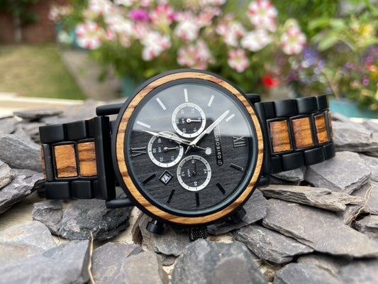 Walnut & Zebrano Interlocking Strap Self Winding Wooden Eco Watch

Made from solid walnut and zebrano, these watches are both comfortable to wear and a unique timepiece. Featuring a black metal interlocking frame strap with inlayed wooden panels to create a unique look.