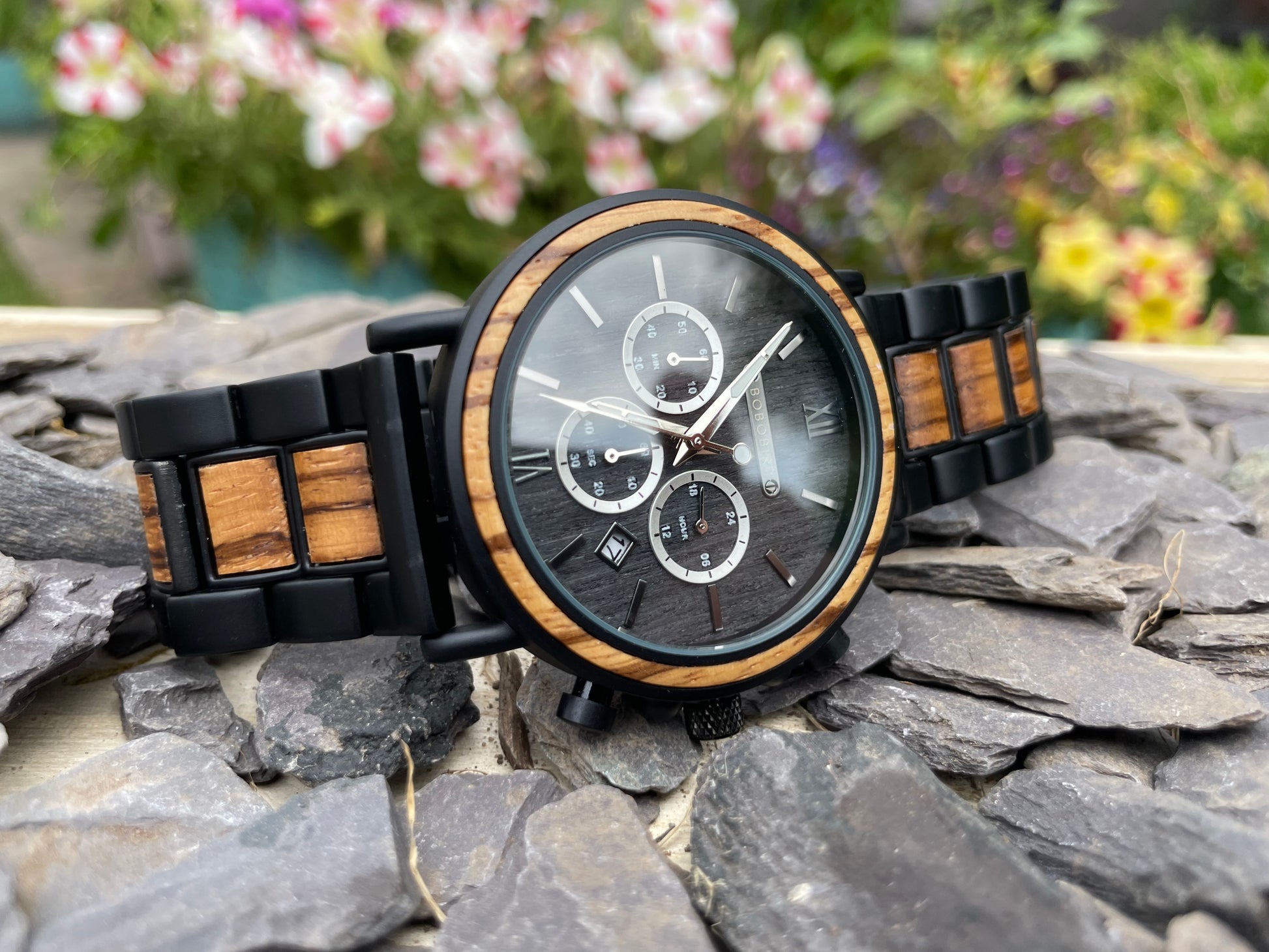 Walnut & Zebrano Interlocking Strap Self Winding Wooden Eco Watch

Made from solid walnut and zebrano, these watches are both comfortable to wear and a unique timepiece. Featuring a black metal interlocking frame strap with inlayed wooden panels to create a unique look.
