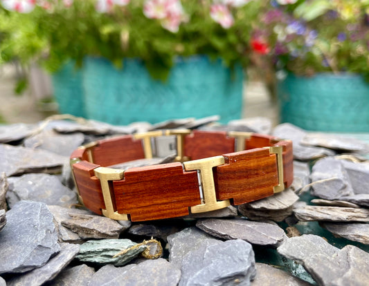 Walnut and Gold Metal Bracelet

Made from solid walnut and gold effect stainless steel; these bracelets are both comfortable to wear and a unique piece of jewellery