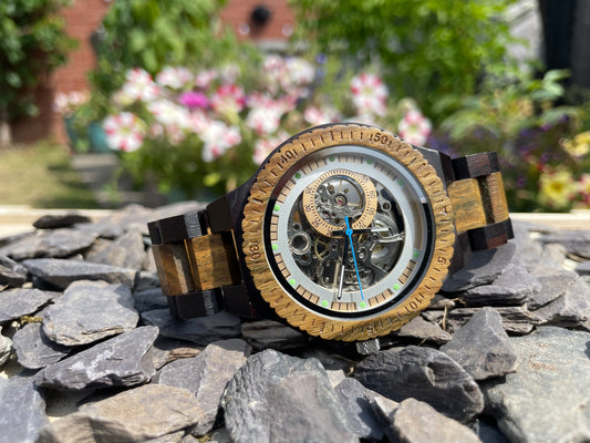 Walnut and Metal Cog Style Interlocking Strap Self Winding Wooden Eco Watcha

Made from solid walnut; these watches are both comfortable to wear and a unique timepiece. 
