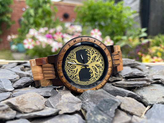 Yggdrasil Tree Of Life Design Wooden Eco Watch

Made from solid wood, these watches are both comfortable to wear and a unique timepiece.

Perfect for fans of Norse mythology; this stylish watch comes with a Yggdrasil or Norse Tree Of Life detail on the watch face. Free UK delivery by Fandomonium