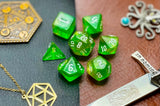 Chaos Fairy Polyhedral Dice Set  Roll your sacrifice to the Chaos Fairies with these green and yellow shimmer resin polyhedral dice set.  They are standard 16mm polyhedral dice sets perfect for Tabletop games and RPG's such as pathfinder or dungeons and dragons.  This set includes one of each D20, D12, D10, D%, D8, D6, D4.