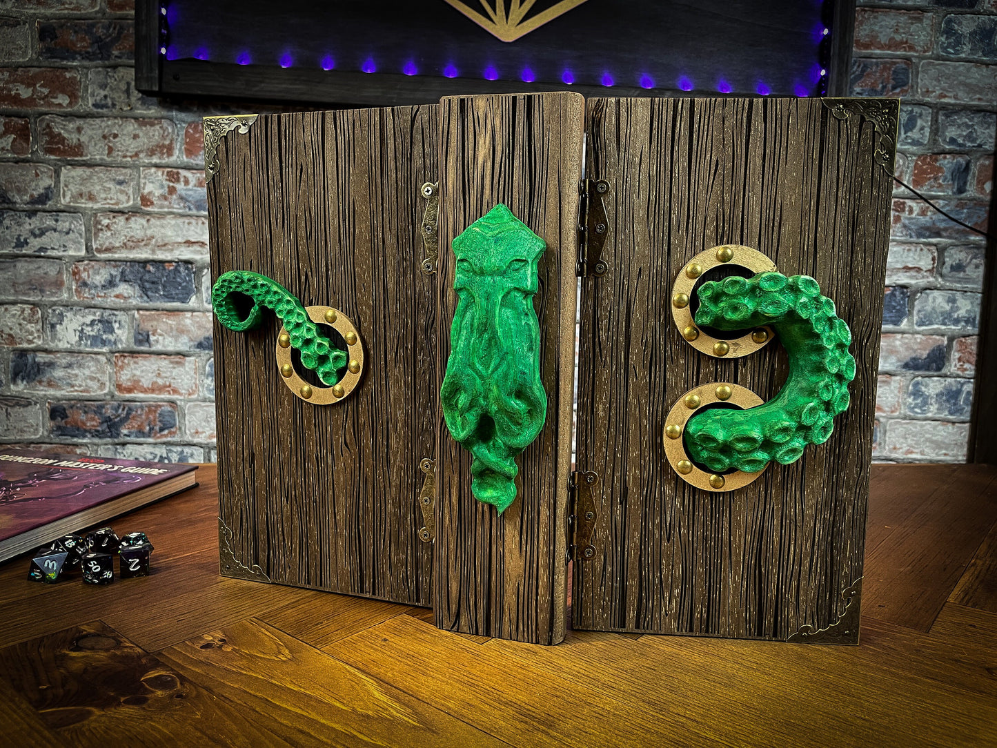 Cthulhu's curse Dungeon Master Screen.Made from solid wood and made to fold to resemble a book when not in use, this screen is stylish, fun and adds atmosphere to any game. Free UK delivery from Fandomonium