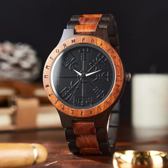 Wooden Norse Viking Design Watch. A unique style of watch with the strap, front and back of the watch all made from highly polished wood. Each time piece comes in a wooden display box and makes a perfect gift for fans of Norse Mythology and Viking Style. Complete with the Vegvisir Viking wayfinder on the watch face giving a unique and stylish look. Each watch also comes with a tool to help you add and remove links and a care & instruction manual.