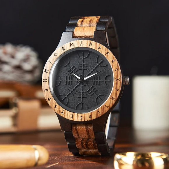 Wooden Norse Viking Design Watch. A unique style of watch with the strap, front and back of the watch all made from highly polished wood. Each time piece comes in a wooden display box and makes a perfect gift for fans of Norse Mythology and Viking Style. Complete with the Viking Helm of Awe symbol on the watch face giving a unique and stylish look. Each watch also comes with a tool to help you add and remove links and a care & instruction manual.