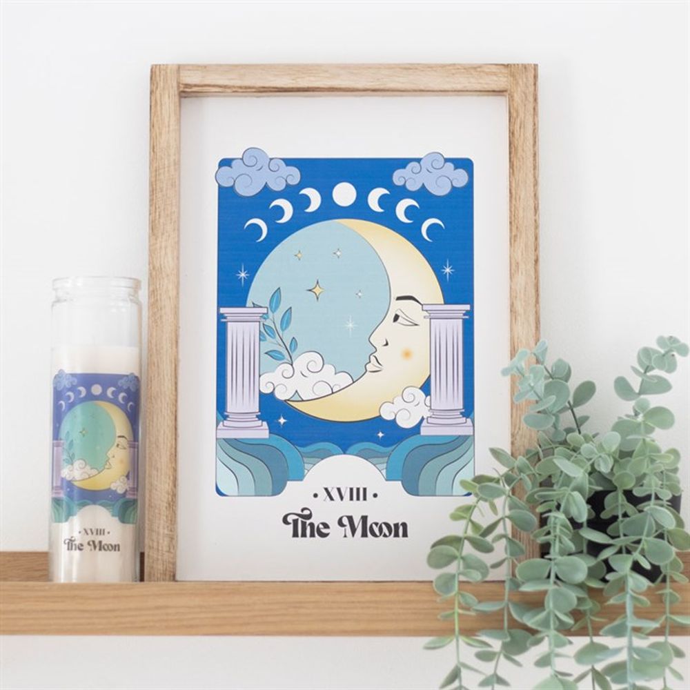 The Moon Celestial Framed Wall Print  This framed art print showcasing 'The Moon' brings a touch of celestial magic to any trendsetter's space, blending mystical vibes with a calming color palette. The serene illustration invites calm, ideal for creating a tranquil corner in the home a bustling young adult's life. Free delivery with Fandomonium