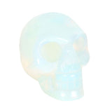 Opalite Crystal Skull  This crystal skull is made from opalite which is a stone renowned for its ability to evoke feelings of love, hope, and generosity. The skull is the perfect size for holding in the palm of your hand then you need a little support or reassurance. Free UK delivery by Fandomonium