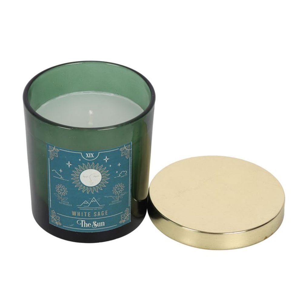 The Sun White Sage Tarot Candle  Presented in a green glass jar with a metallic gold lid, this white sage scented candle looks just as amazing as it smells. The candle has a tarot design of 'The Sun' card giving it a mystical style. Comes in its own decorative box making and ideal gift idea. Free UK delivery by Fandomonium