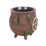 Pentagram Bark Effect Resin Cauldron Plant Pot  Grow herbs and special plants in this unique cauldron shaped plant pot complete with rustic bark-effect finish and pentagram design. Whether you want to place it on the windowsill in your kitchen or out in the garden, this magic-inspired planter is sure to bring a spell of good luck and help to protect budding plants as they grow. Free UK delivery by Fandomonium