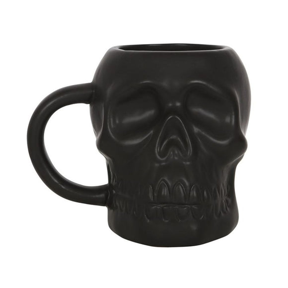 Matte Black Skull Mug  Featuring a classic black skull in a matte finish this mug will make a fun addition to any collection. 500ml capacity. Do not microwave. Handwash only. Free UK delivery by Fandomonium