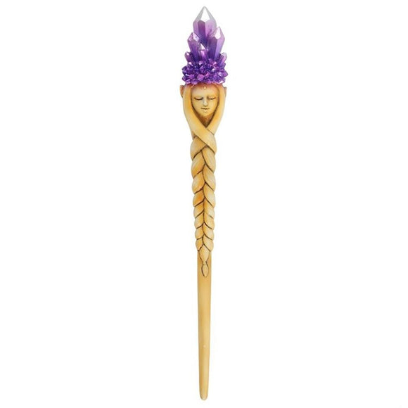 Purple Crystal Goddess Wand  This stunning resin wand features a pearlescent, purple crystal cluster atop the head of a serene goddess. With a braided stem details and beautiful design, this wand is fit for a queen. Please note that this wand is not a toy and should be handled with care. Free UK delivery by Fandomonium