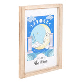 The Moon Celestial Framed Wall Print  This framed art print showcasing 'The Moon' brings a touch of celestial magic to any trendsetter's space, blending mystical vibes with a calming color palette. The serene illustration invites calm, ideal for creating a tranquil corner in the home a bustling young adult's life. Free delivery with Fandomonium