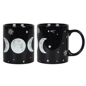 Triple Moon Ceramic Mug  A ceramic mug featuring a mystical Triple Moon design surrounded by twinkling stars. The Triple Moon symbolises the waxing, full and waning moon phases of the Triple Goddess (the Maiden, the Mother and the Crone, also known as the Divine feminine).