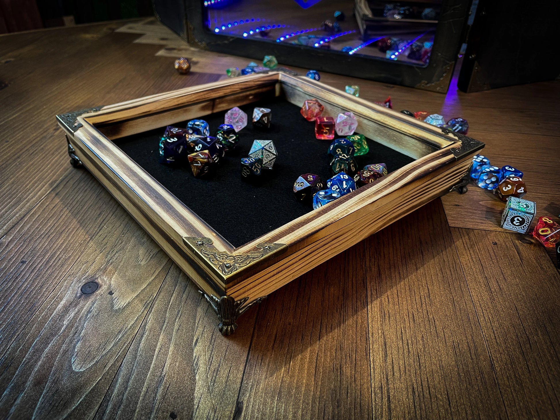 The Dragons Breath Dice Rolling Tray.  Our solid wood roll trays are hand charred and available in a choice of 9 colours and 3 sizes We first charr each tray with a blowtorch before staining in your choice of color, waxing and buffing it to give a long lasting shine and protection.